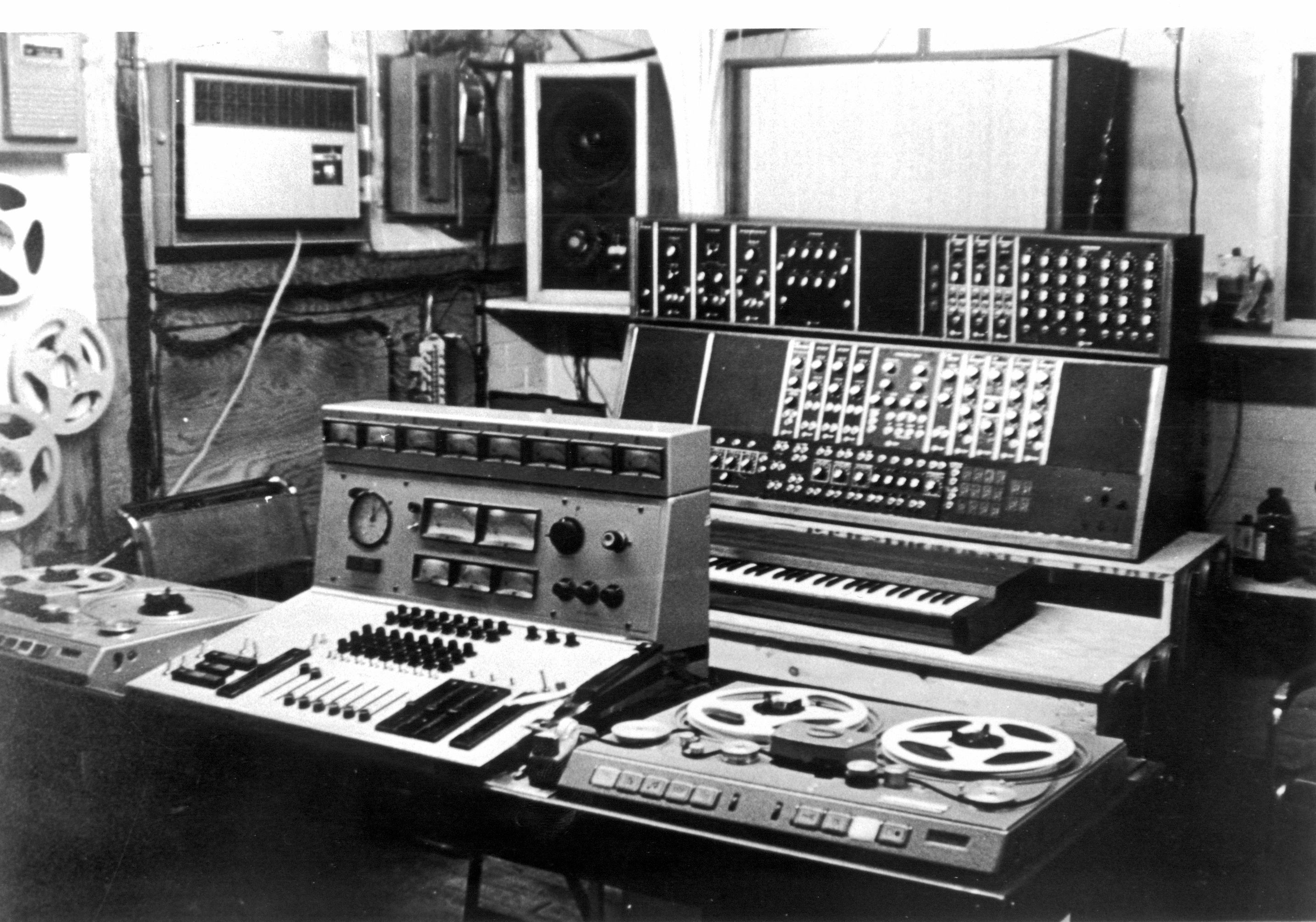 Example of an older tape-based studio, with twin Studer tape decks flanking a mixing console.